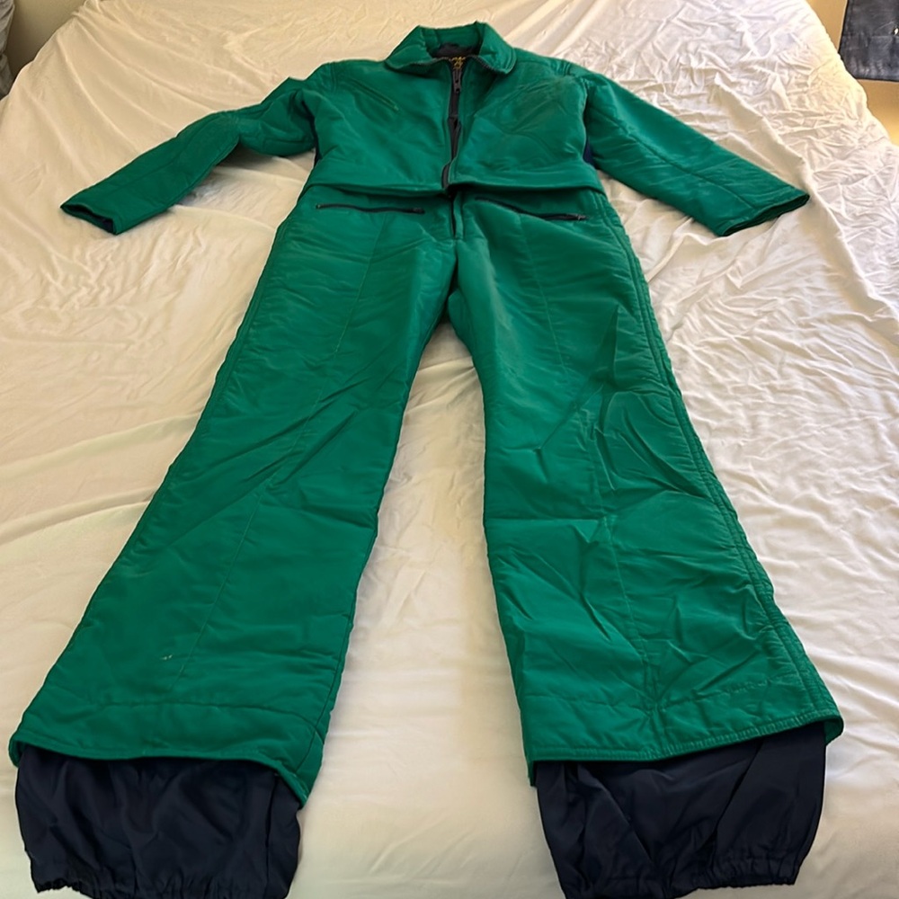 This is a two piece snowsuit by Spinnerin, green, size 50, whatever that means.
